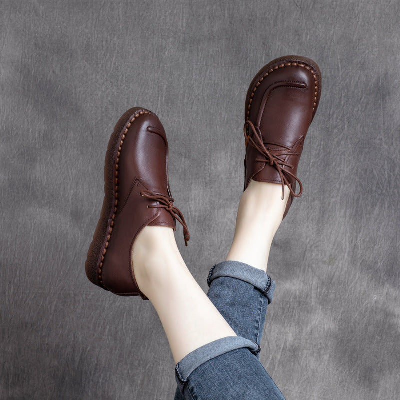 Chaussures plates à lacets et talon bas en cuir de vachette