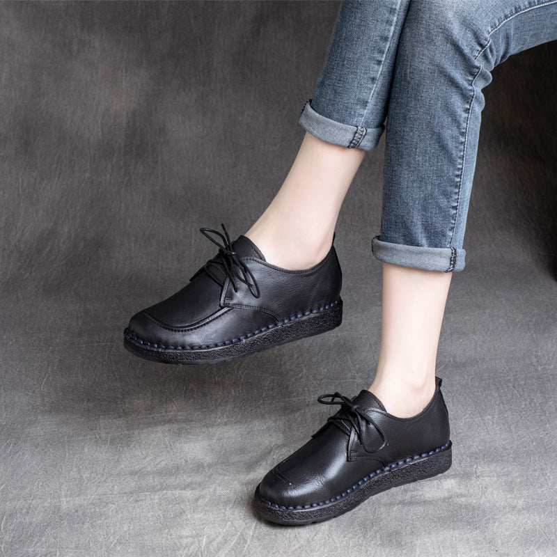 Chaussures plates à lacets et talon bas en cuir de vachette